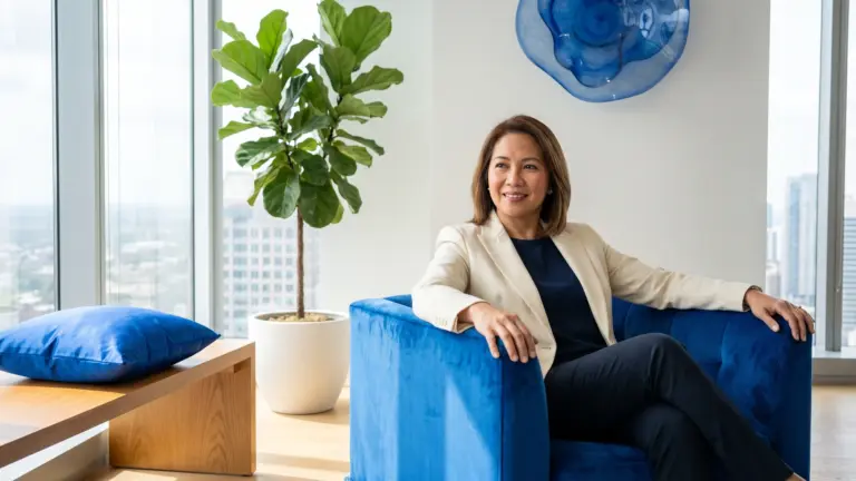 A confident law firm professional at ease in a bright modern office, illustrating the smart economics of virtual legal support