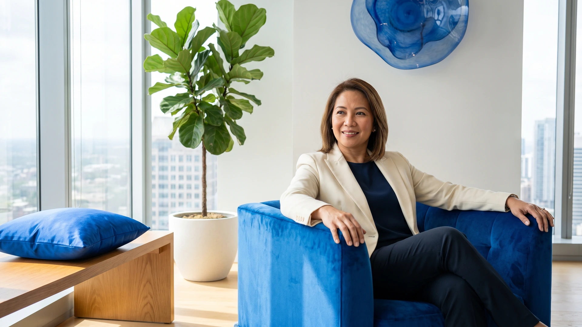 A confident law firm professional at ease in a bright modern office, illustrating the smart economics of virtual legal support